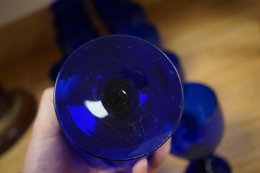 A collection of fourteen Bristol blue glass rummers, largest 15cm high